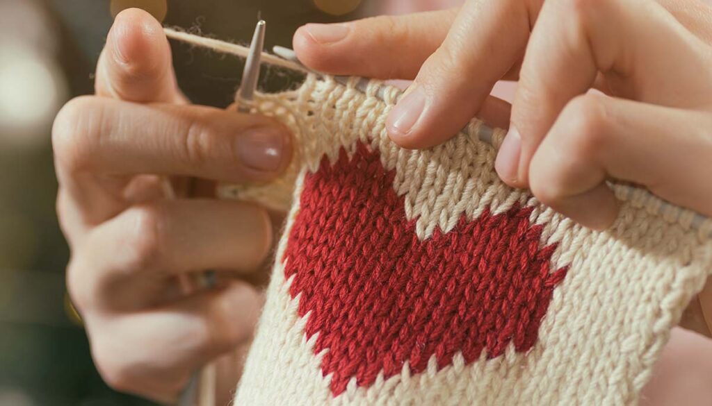 Close up of hands knitting