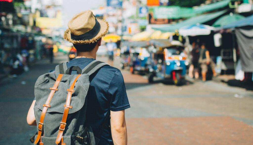 man traveling with backpack