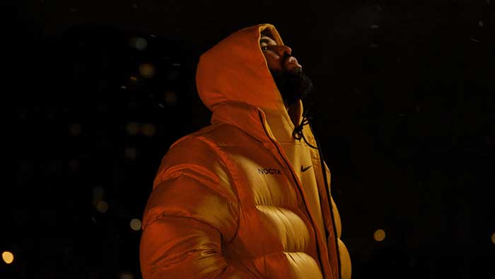 Drake's NOCTA collection with Nike, featuring orange puffer jacket