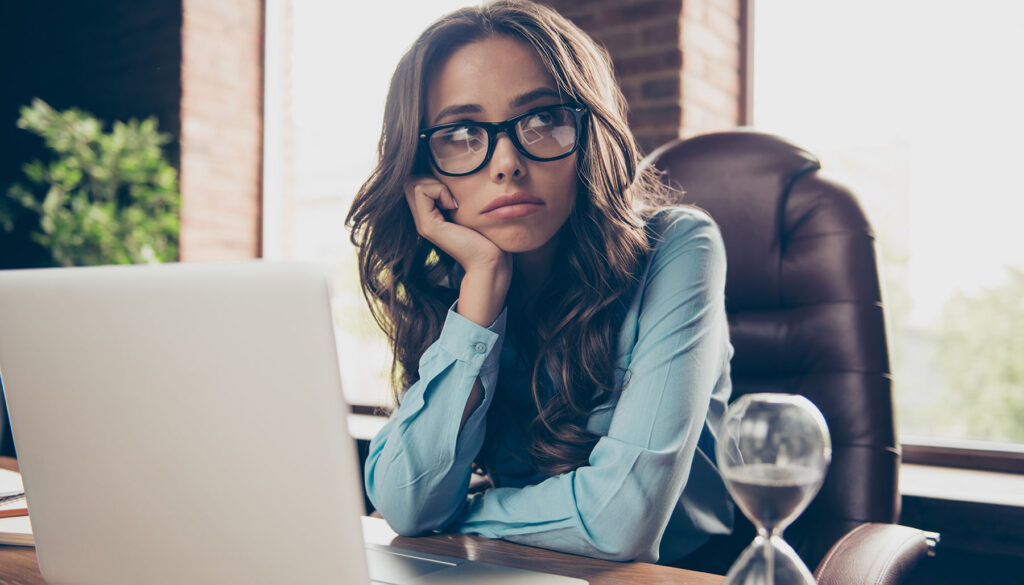 frustrated young woman in an office