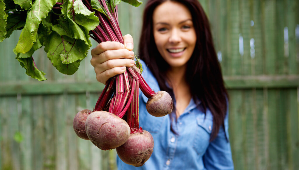 Woman holding beets