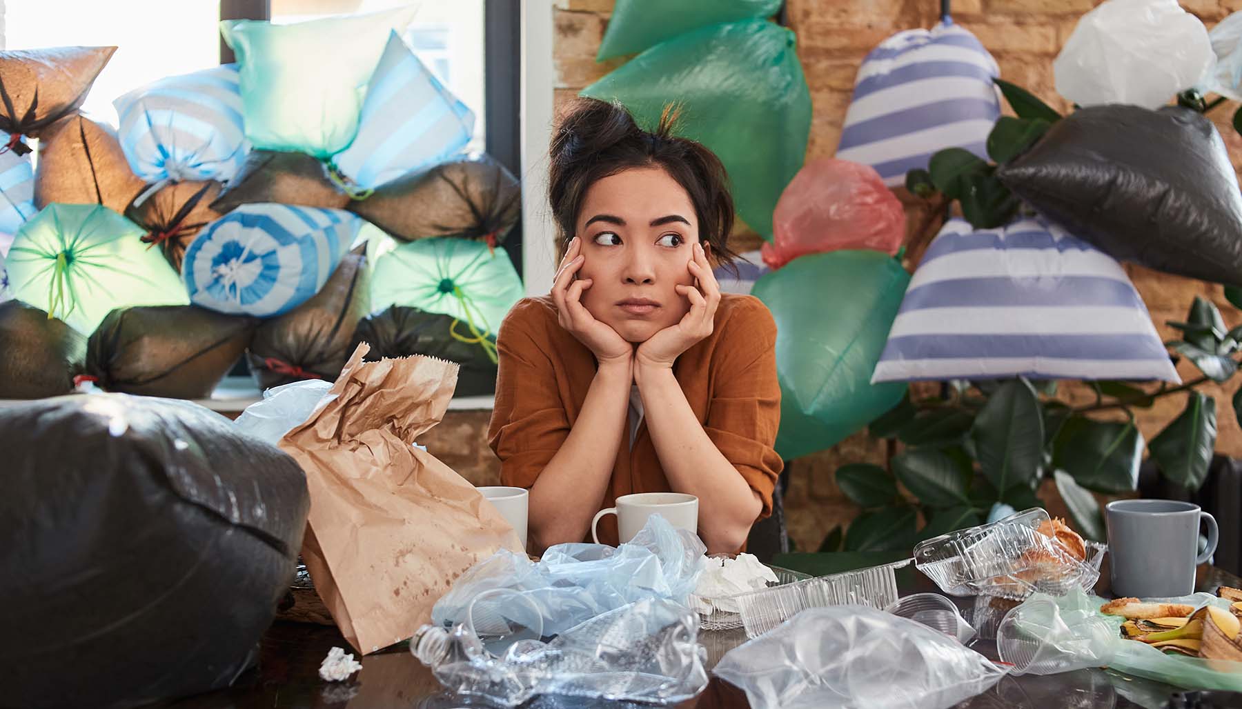 A woman who is overwhelmed by clutter