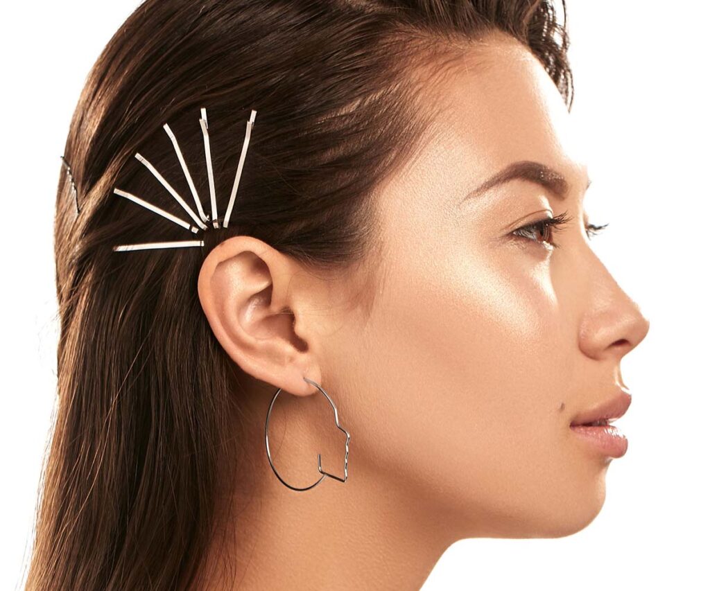 Woman modeling hairpins