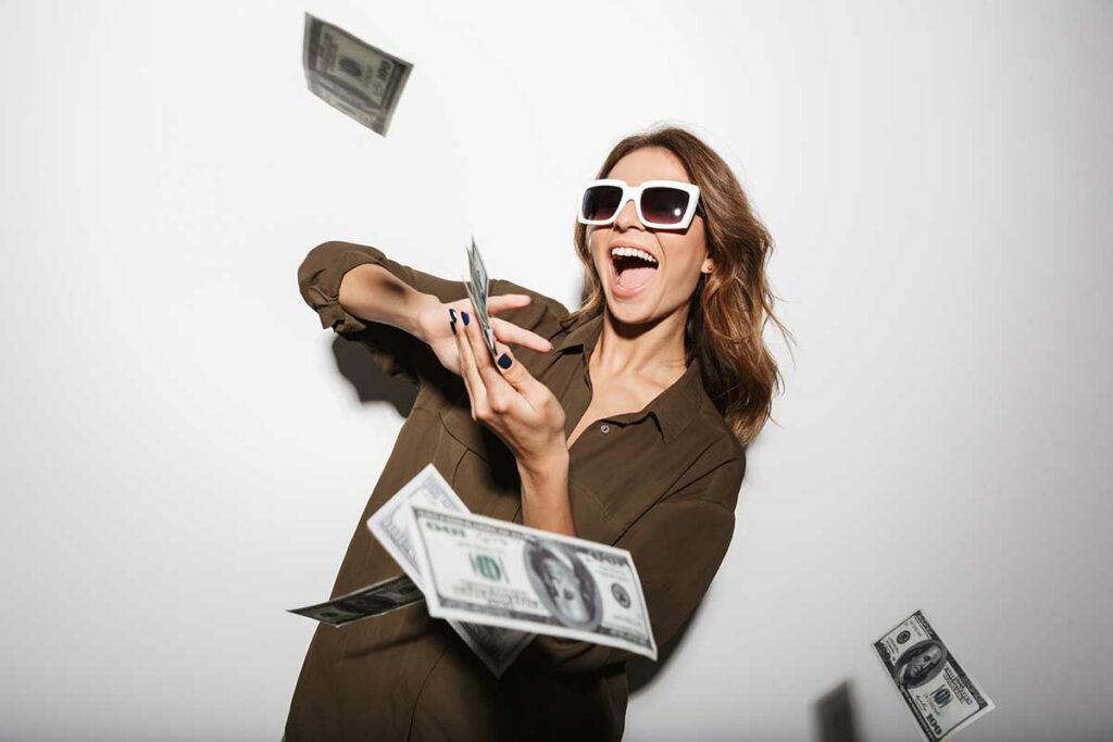 woman throwing money