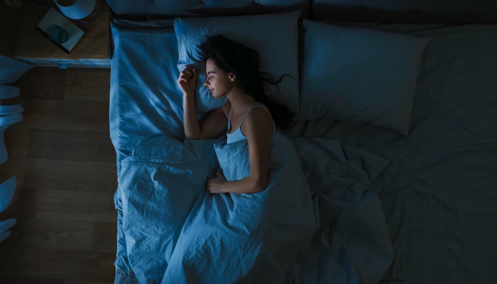 Overhead view of woman sleeping