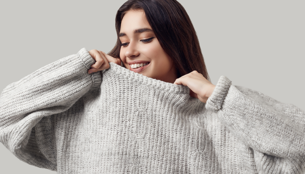 Woman in white sweater