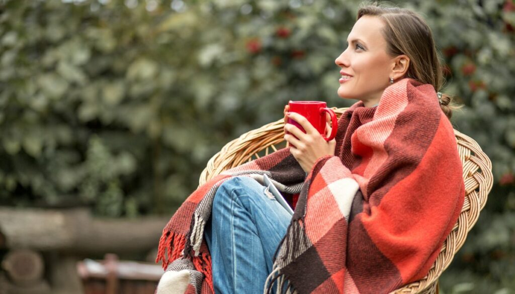 sitting outside with blanket