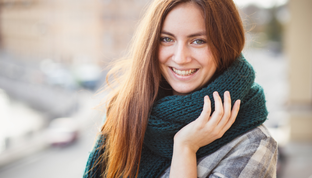Woman wearing chunky knit scarf