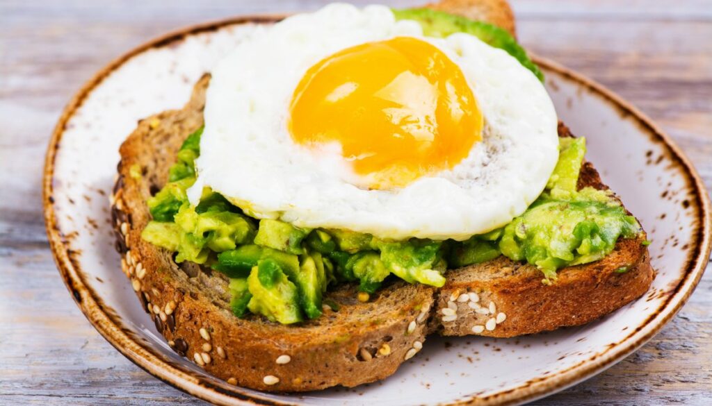 avocado toast with egg on a plate