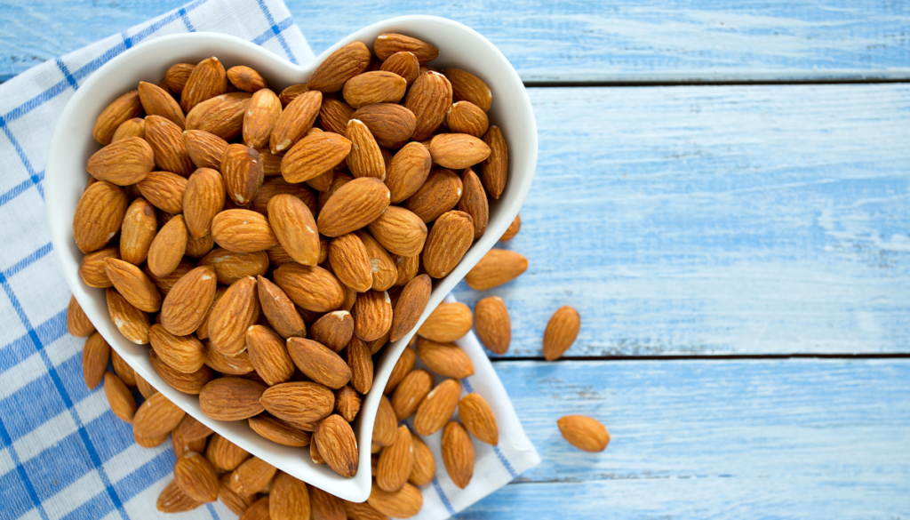 Heart shaped dish filled with almonds