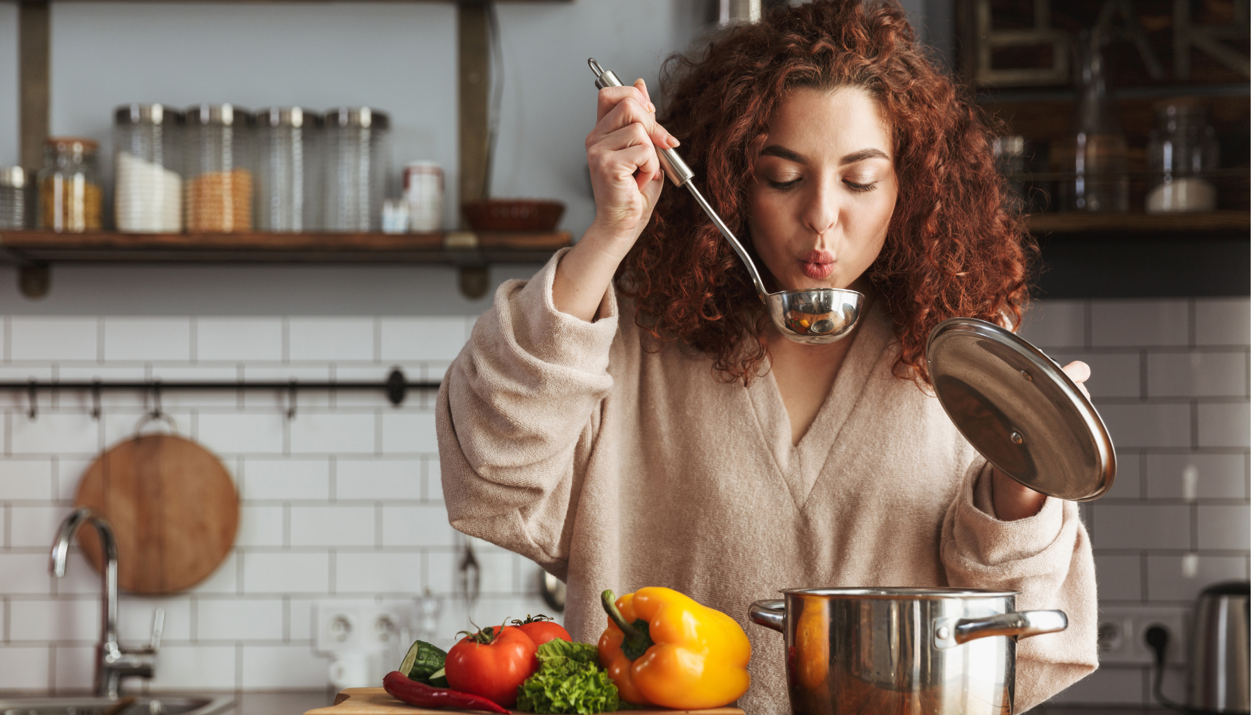 Woman sipping soup from a ladle