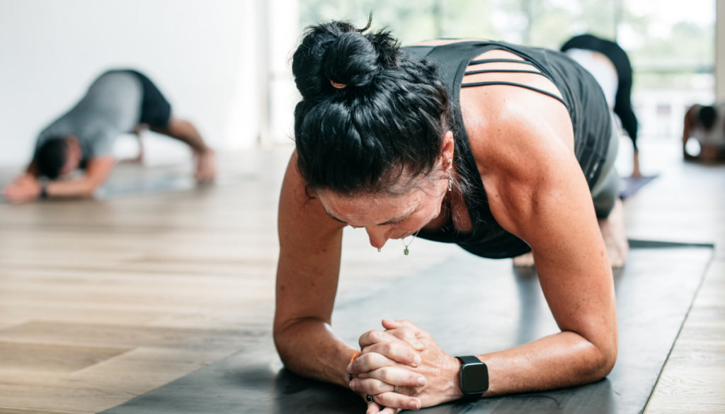 Woman doing hot yoga