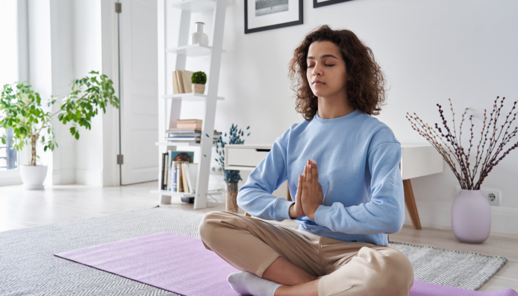 woman sitting in lotus pose