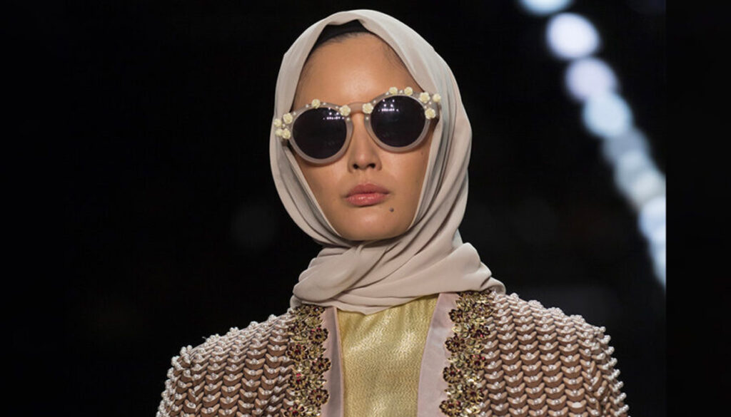 model-in-sunglasses-and-headscarf-high-fashion-runway