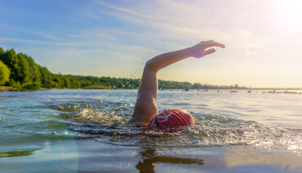 Woman swimming in a lake