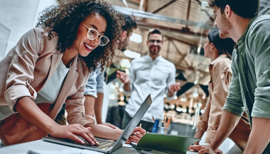 Woman with laptop in meeting