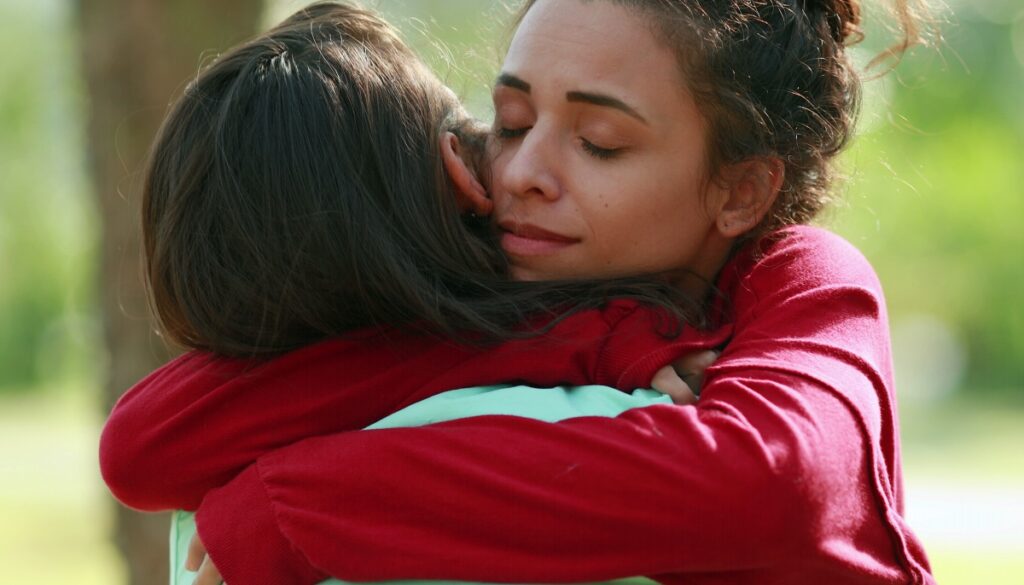 two friends hugging