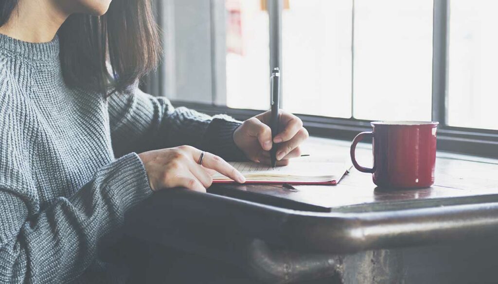 woman writing a letter