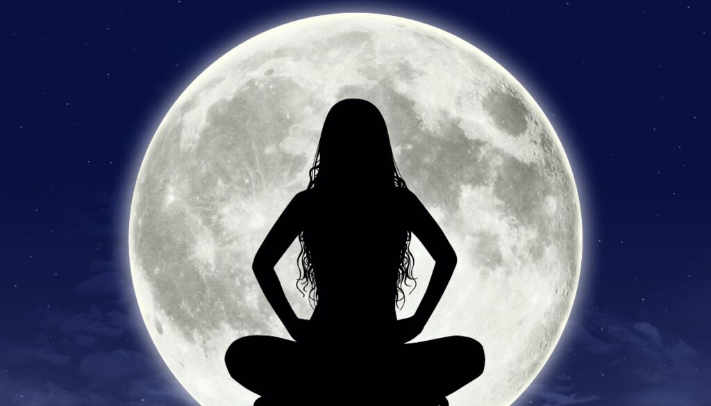 woman silhouette in front of full moon