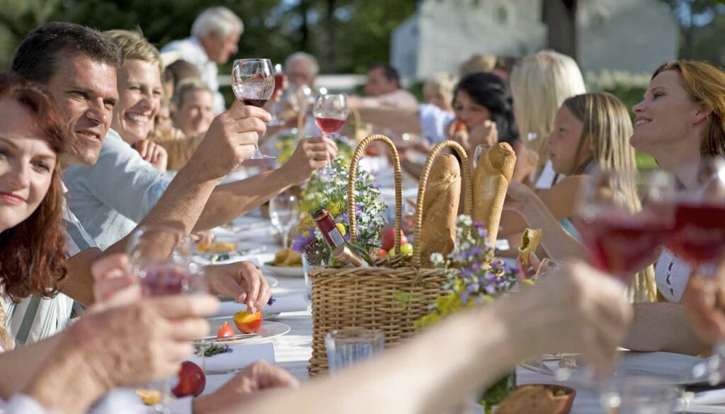 guests at a table, casual wedding outdoors