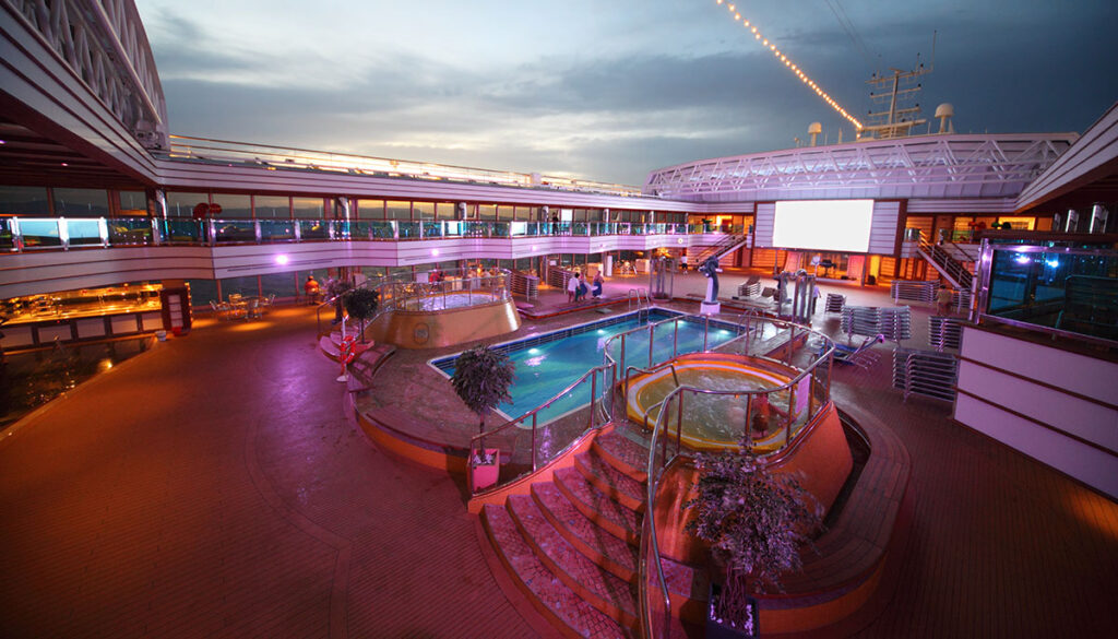 PERSIAN GULF - APRIL 14: Overview of the deck of Costa Deliziosa with screen, pool and baths - the newest Costa cruise ship, April 14, 2010 in Persian Gulf.