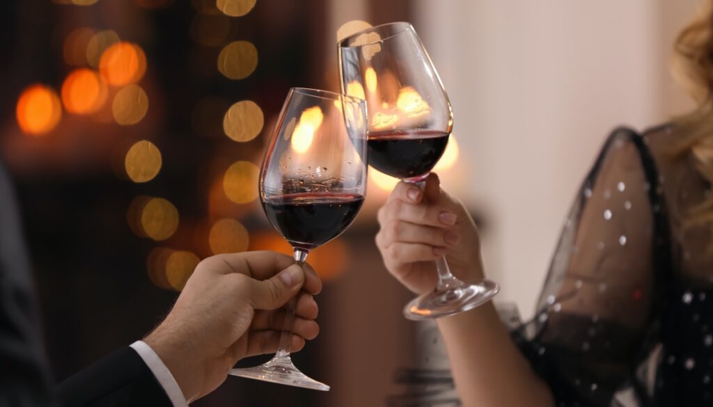 two people with wine glasses