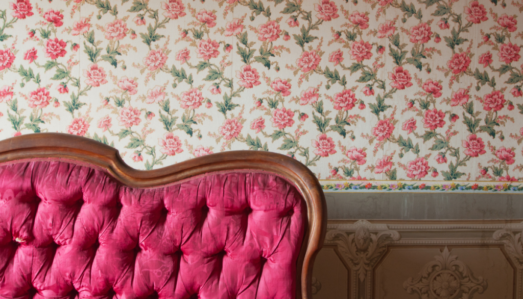 Vintage couch and floral wallpaper