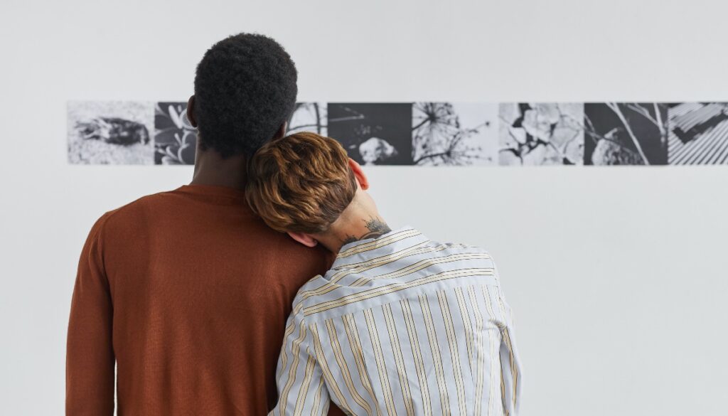 couple is admiring artwork together
