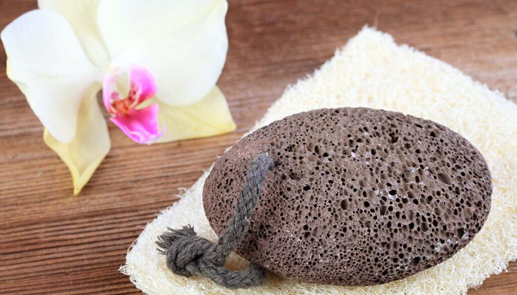Volcanic pumice stone on the  washcloth  in rustic style.