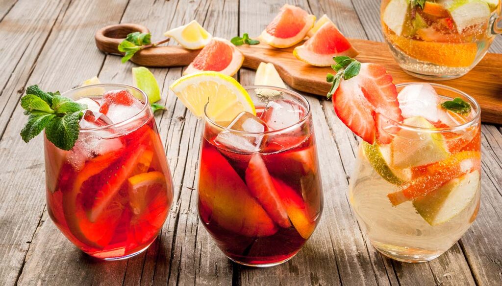 Traditional summer drink sangria in red, pink and white.