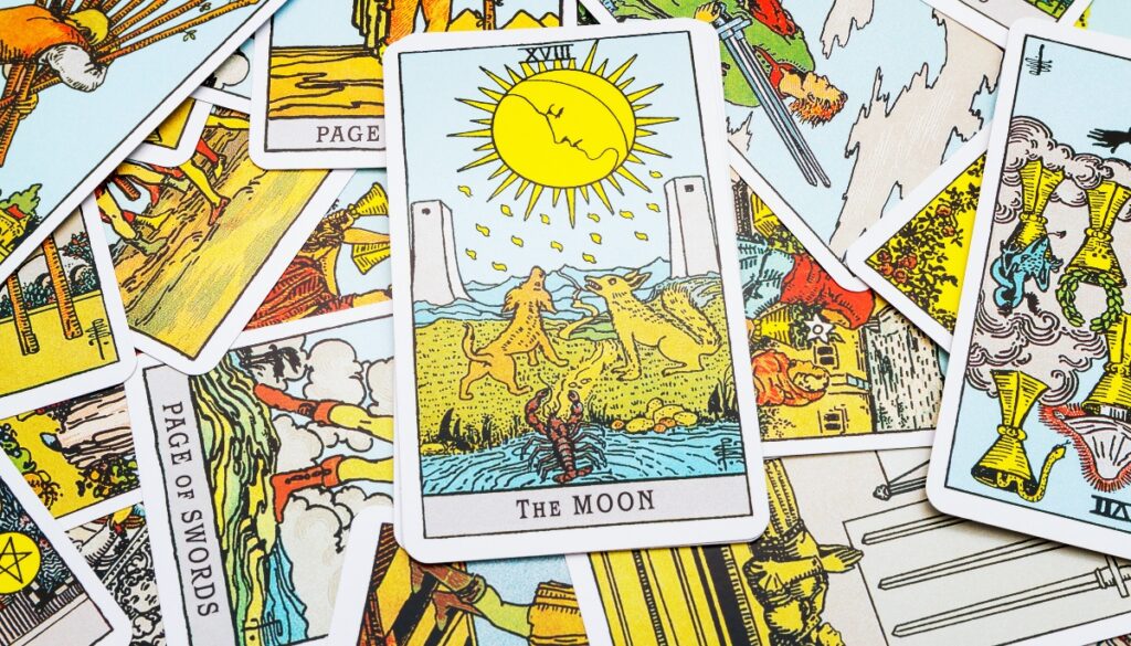 the moon card on a pile of cards