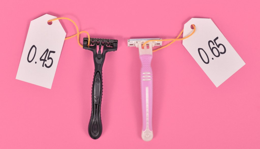 Man's razor and woman's razor with price tags attached on pink background