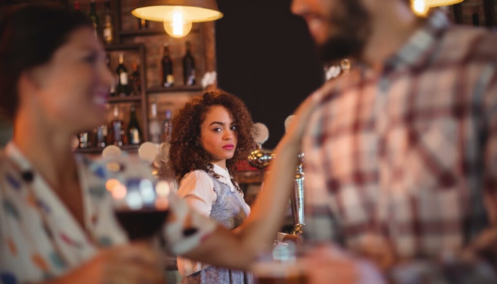 jealous woman looking at flirting couple