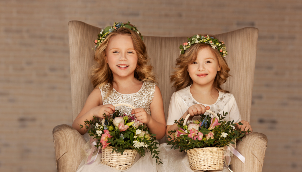 Flower girls with flower crowns and baskets of flowers