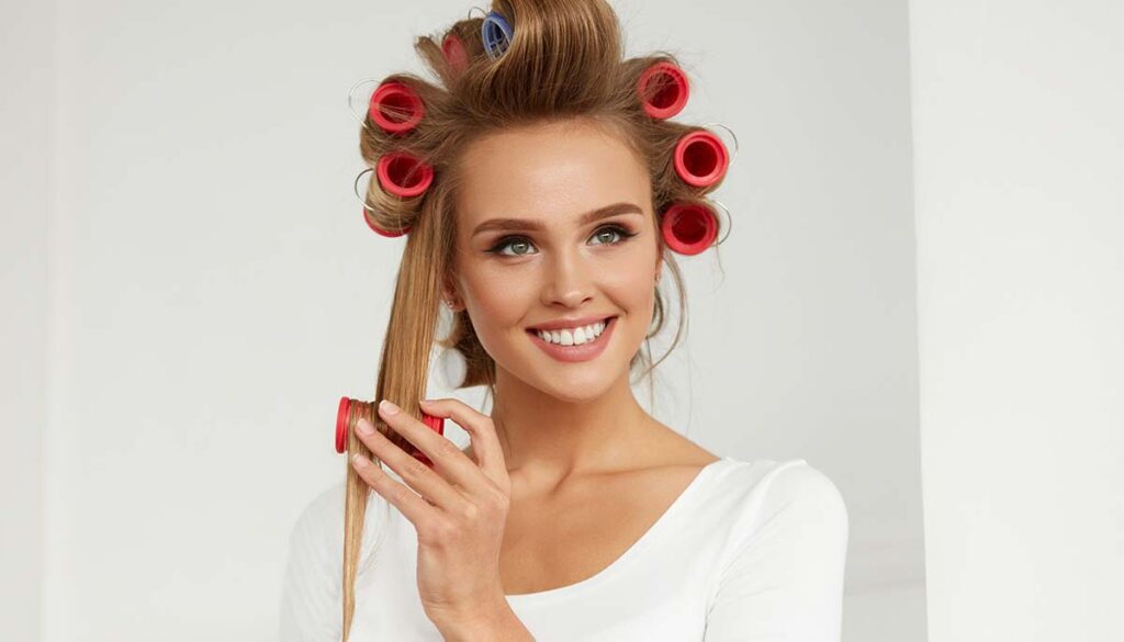 woman with fine, flat hair using hair rollers