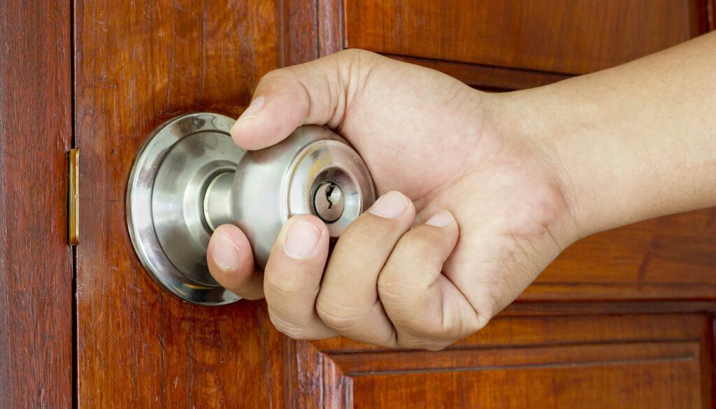 hand on the door knob