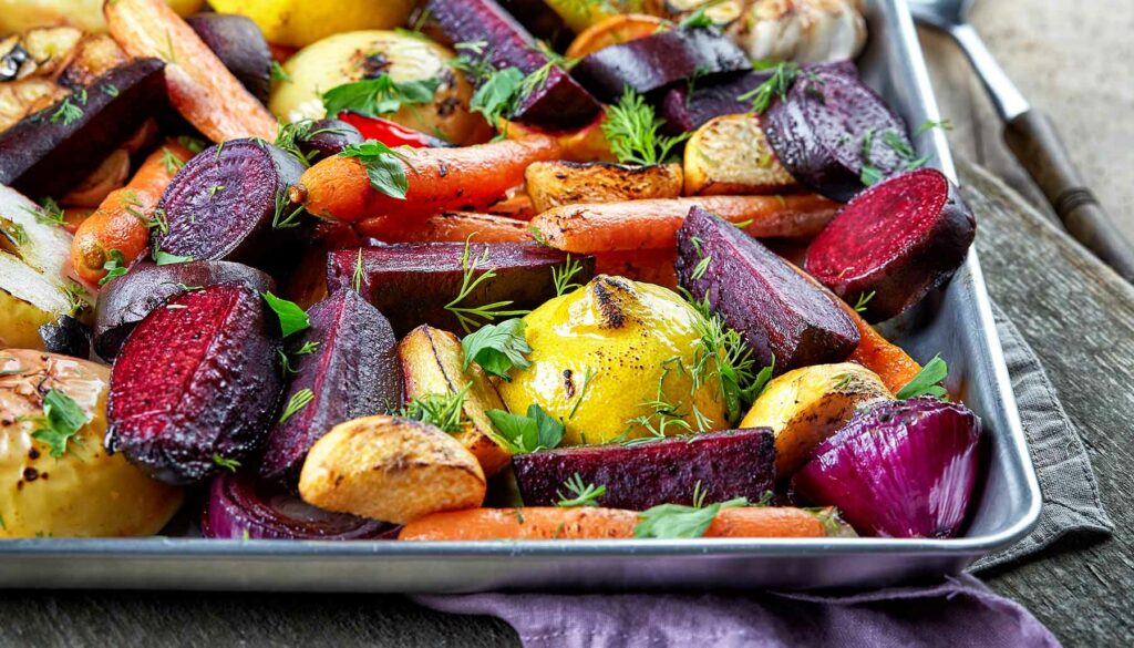 roasted vegetables on a sheet pan