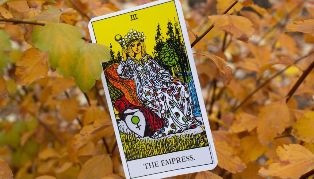 the empress card surrounded by leaves