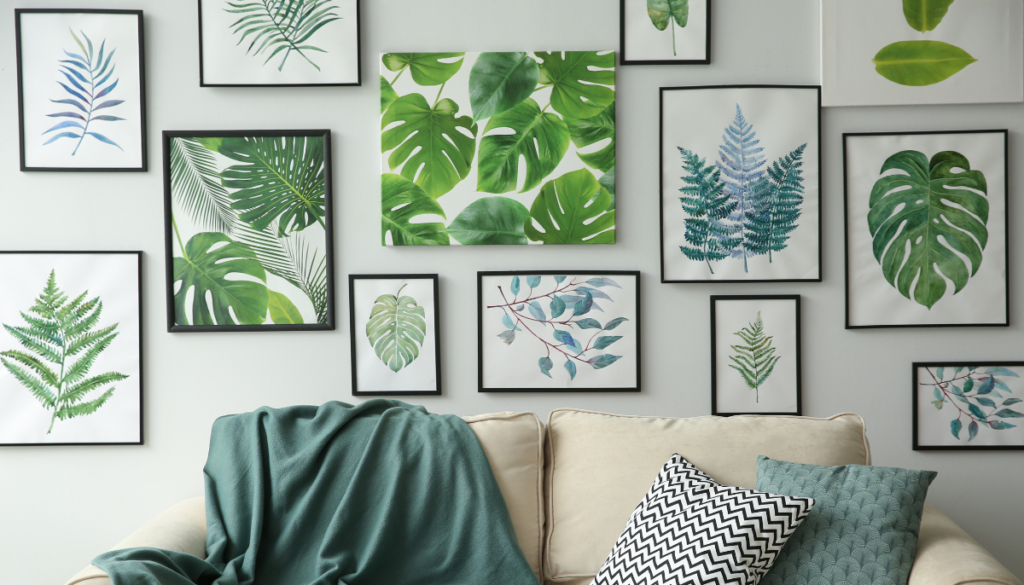 A gallery wall with all green leaf prints