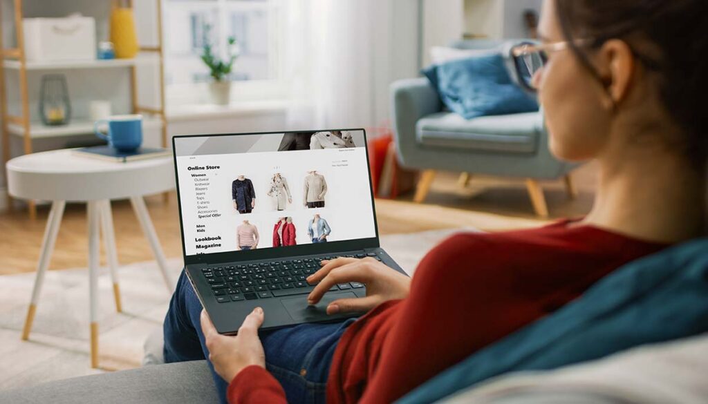 woman looking at clothes on online store