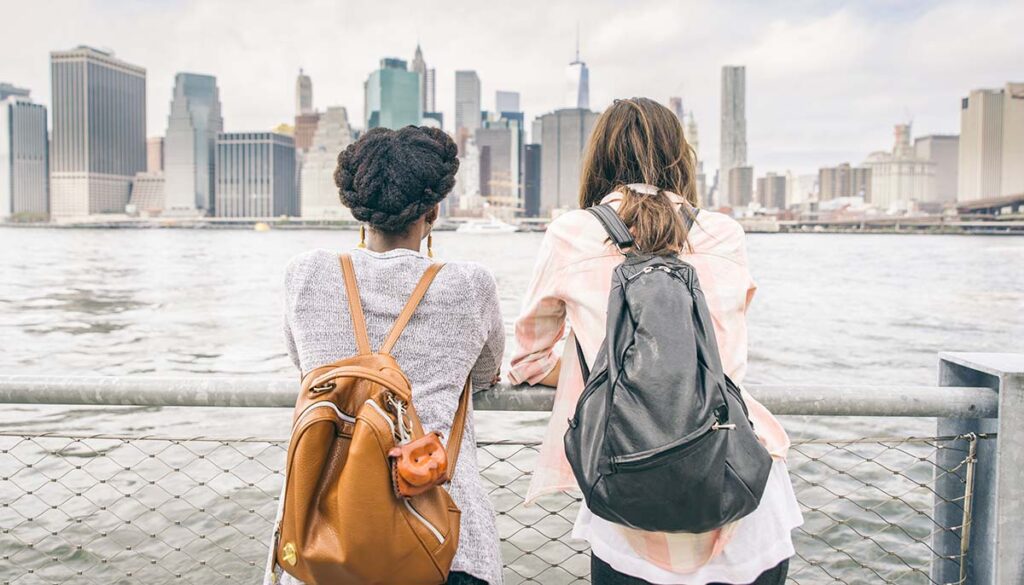 Two women looking at New York skyline
