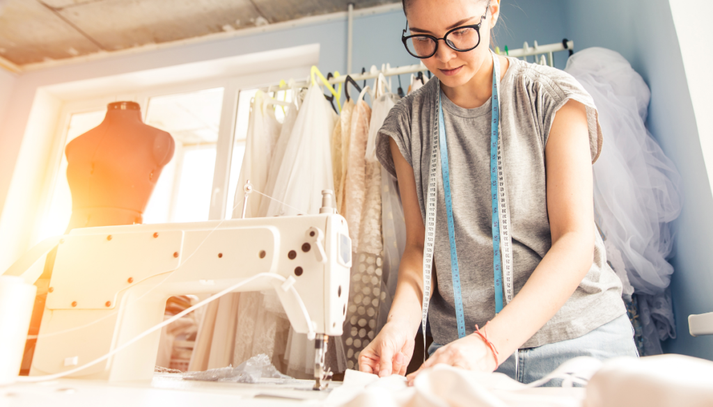 Woman using sewing machine