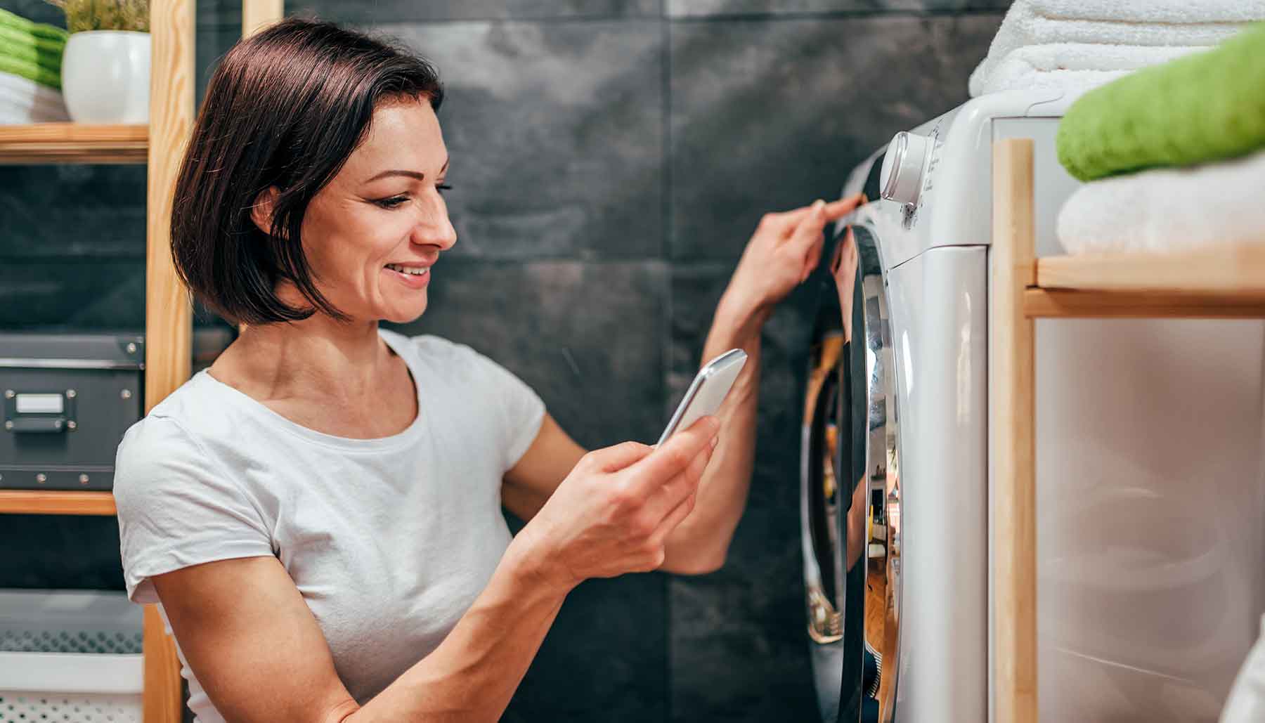 Woman using a smart washer