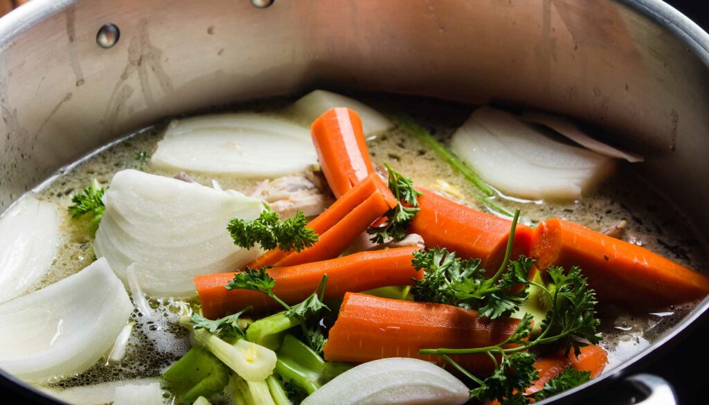 Pot of ingredients to make vegetable broth