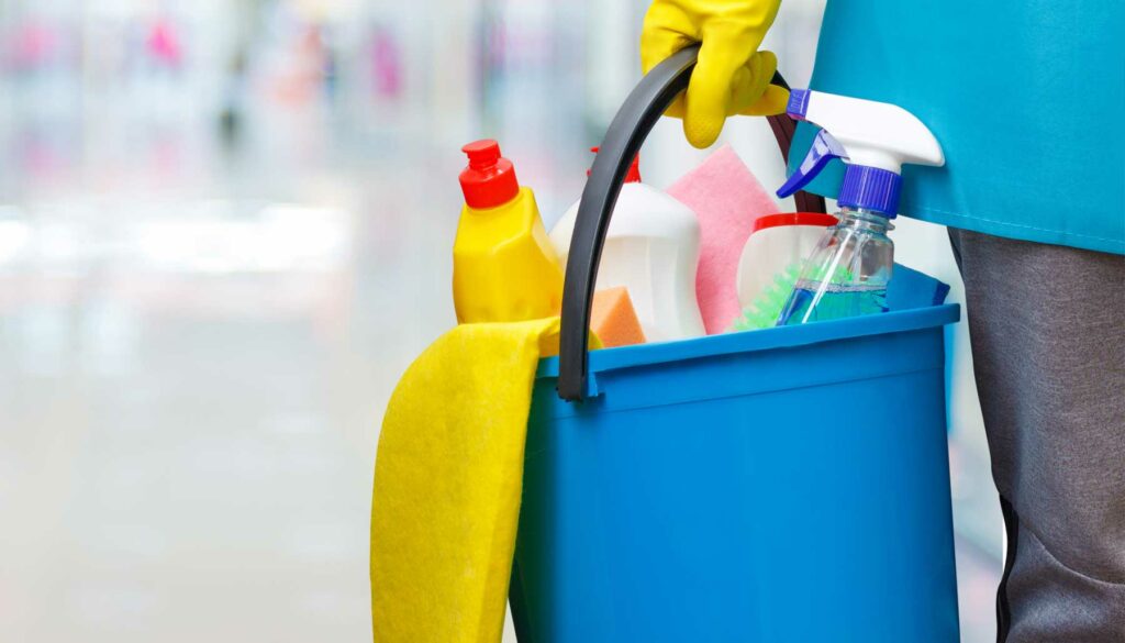 cleaning products being carried in a bucket
