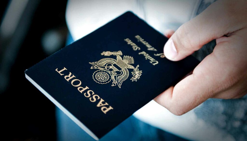 passport in hand, travel concept