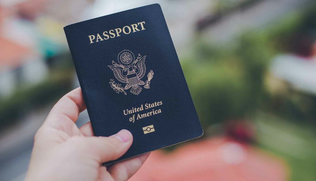 person holding a U.S. passport