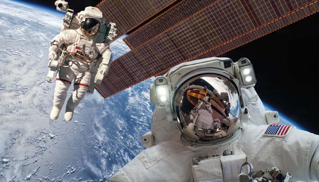 astronauts floating in space